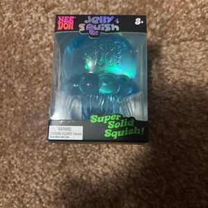 Nee Doh Jolly Squish Super Solid Squish - Blue Iridescent Jelly